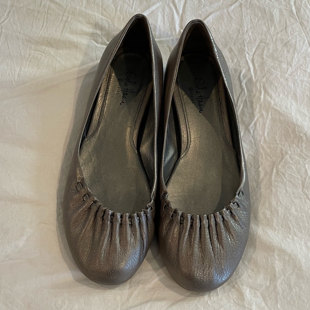 Very good condition dark silver Cole Haan flats!